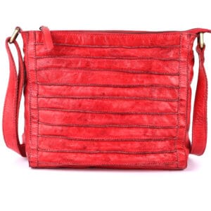 Handcrafted red leather sling bag by a premium leather goods manufacturer