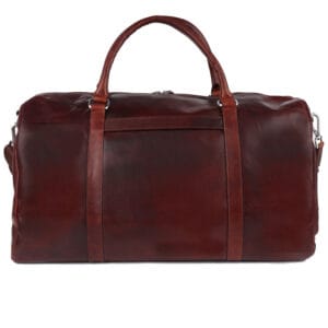 Handcrafted brown leather duffle bag with dual handles available at a premium bag shop
