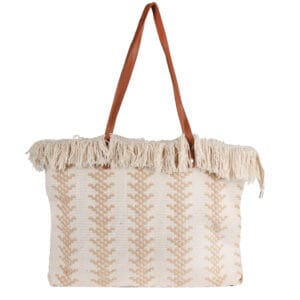 Handcrafted boho tote bag made from jute and cotton with fringe detail and leather shoulder straps.