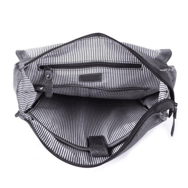 Interior view of a black leather bag with striped fabric lining and organized compartments by leather goods manufacturer in India