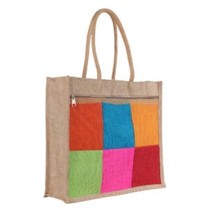 Natural jute bag made in India with colorful patchwork front and top zipper, featuring eco-friendly design