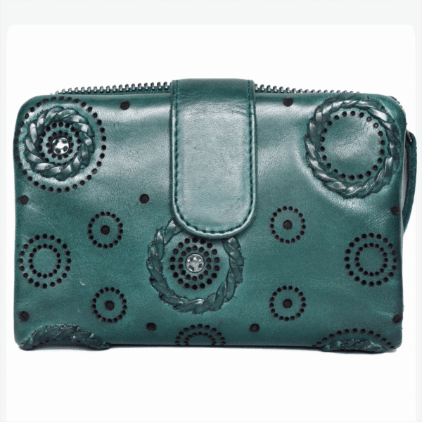 Green leather women's wallet with circular embossed and cutwork floral patterns and snap-button closure