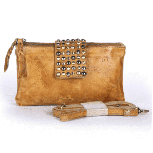 Tan genuine leather sling bag for women with studded flap and detachable strap.