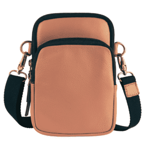 Peach-tan mini leather side bag for girls with dual compartments and black adjustable shoulder strap.
